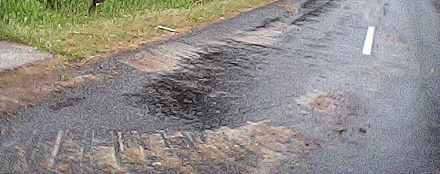 Dirty truck tyre marks on country roads coming and go from a property's driveway may indicate an illegal dumpsite.