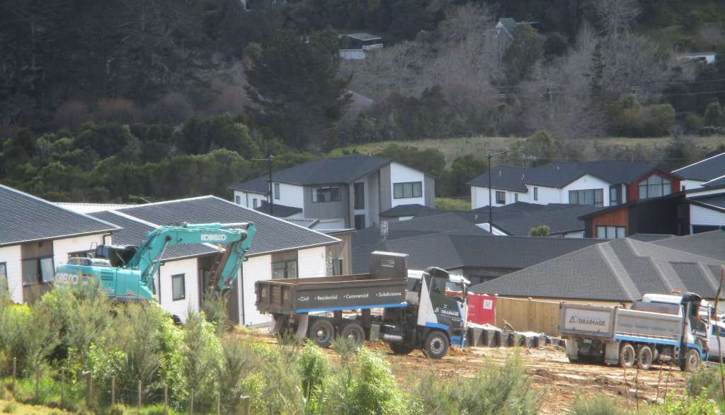 Affordable Drainage (owned by Matthew and Claire Skellon) trucks loading up with contaminated fill at JXZ Investment Ltd's 16 Kātote Ave, Swanson, Auckland development site to be illegally dumped at Lucky Lopesi and Georgia Gardner-Lopesi's property at 100 Christian Road, Swanson, Auckland, in the Waitākere Ranges heritage area.